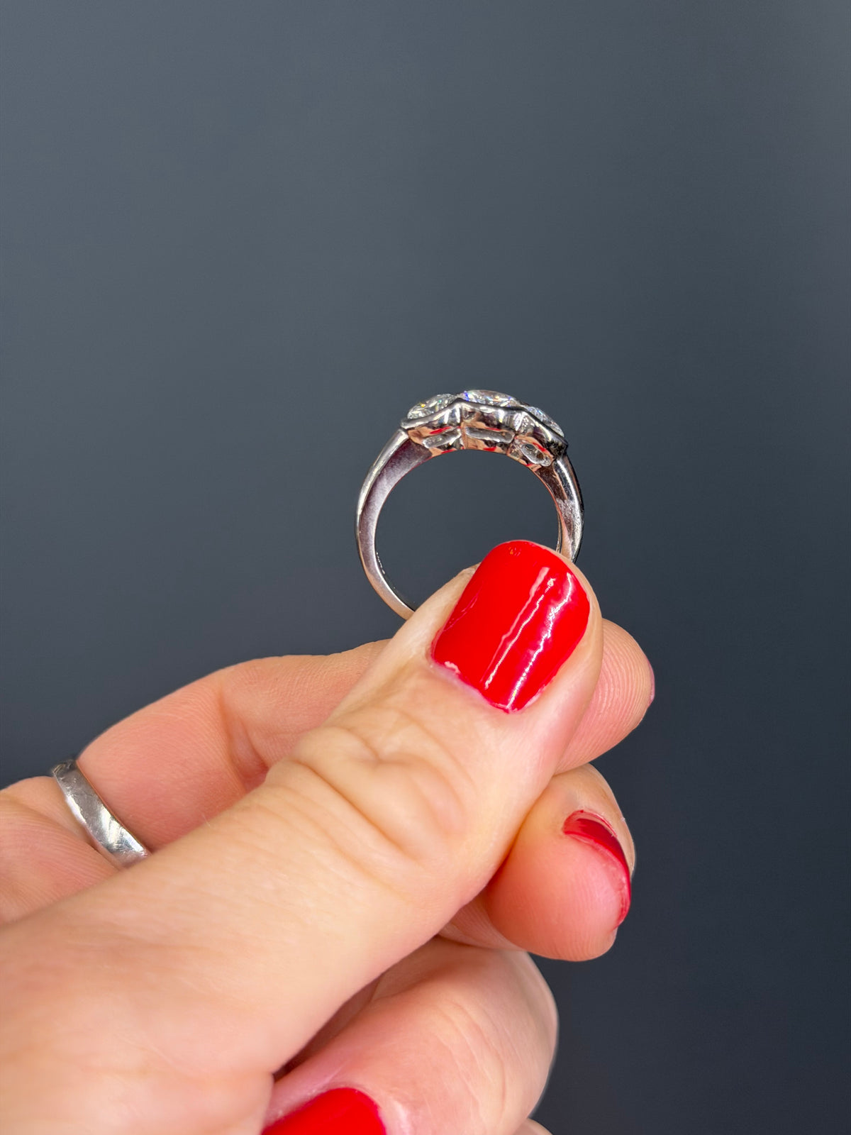 Platinum Three-Stone Diamond Bezel Ring