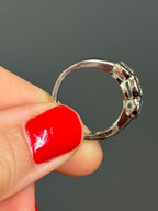 Platinum Three-Stone Diamond Bezel Ring