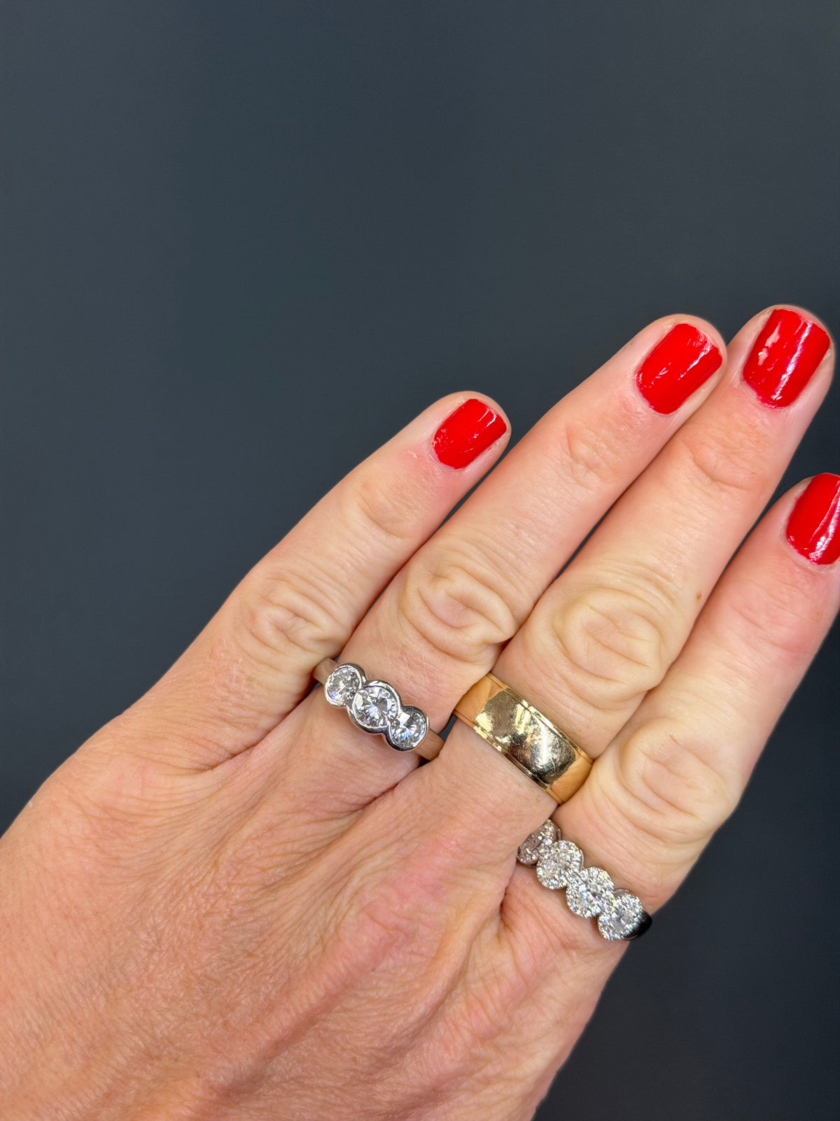 Platinum Three-Stone Diamond Bezel Ring
