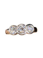 Platinum Three-Stone Diamond Bezel Ring